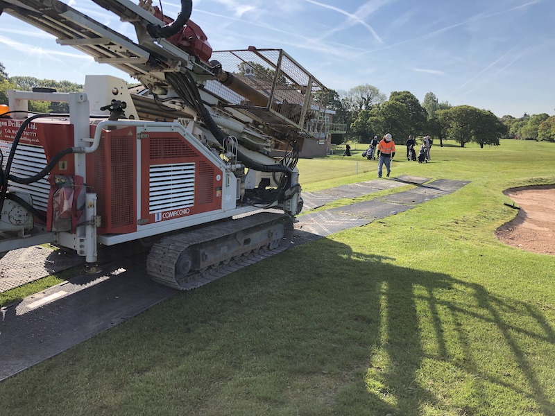 borehole drilling in progress at golf course